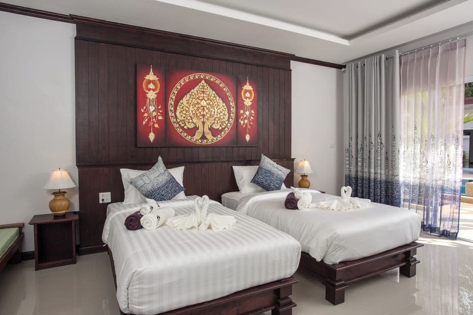 Deluxe Room, Pool View | Blackout drapes, rollaway beds, free WiFi