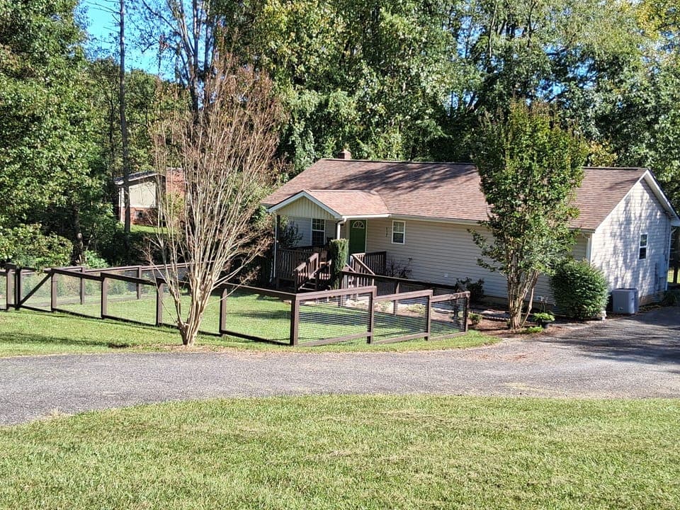 Newly added fenced front yard area.  Great for pets or children playing.