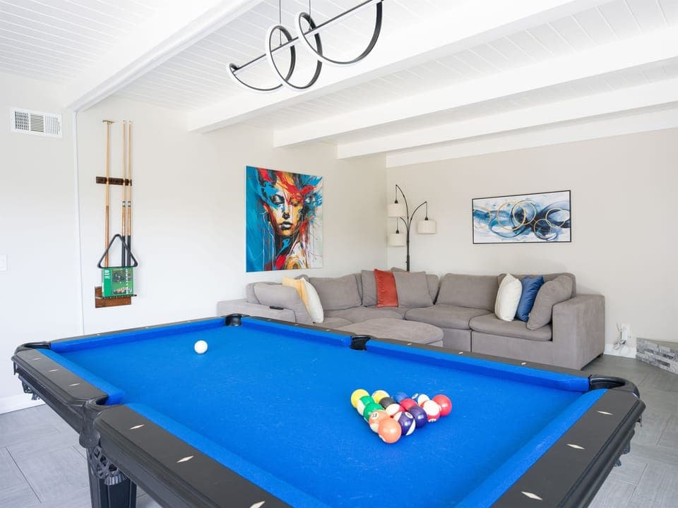 Slate pool table for game nights and cloud couch