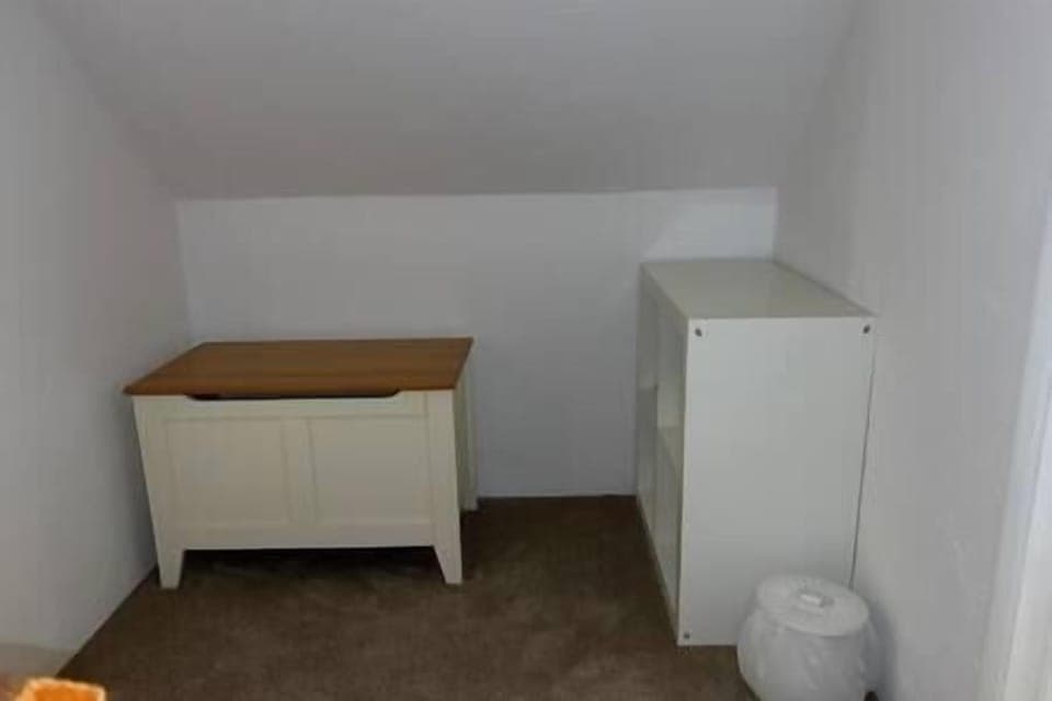 Toy box and area between the two twin rooms upstairs