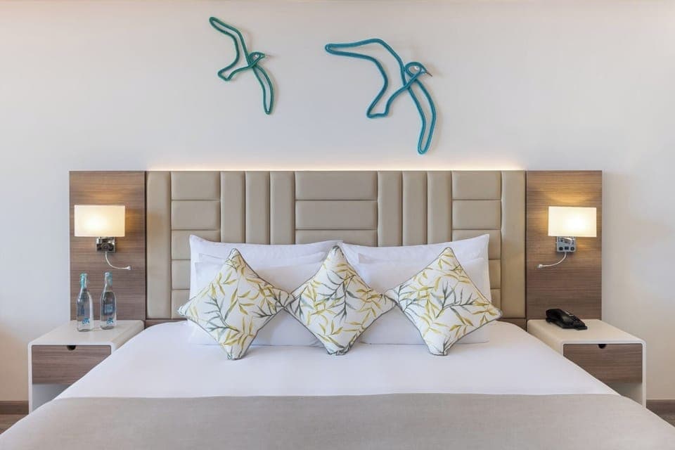 Premium bedding, down comforters, memory foam beds, minibar