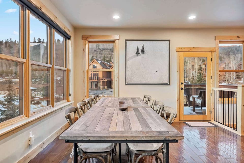 Dining Room: 7-person dining table, connected to kitchen and living room
