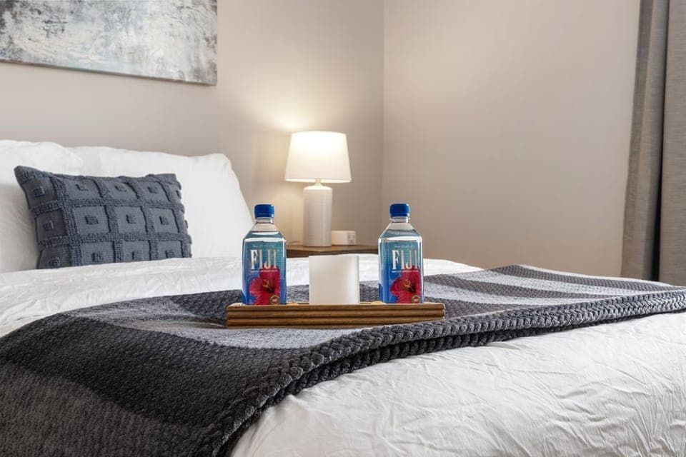 Another view of the queen bed in the guest bedroom 