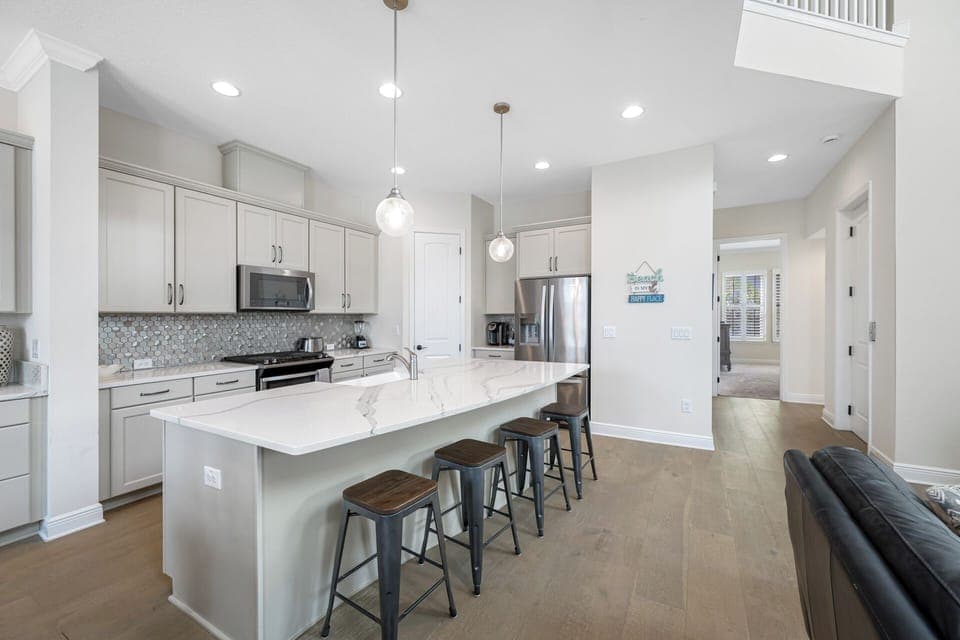 Gourmet kitchen boasts marble countertops