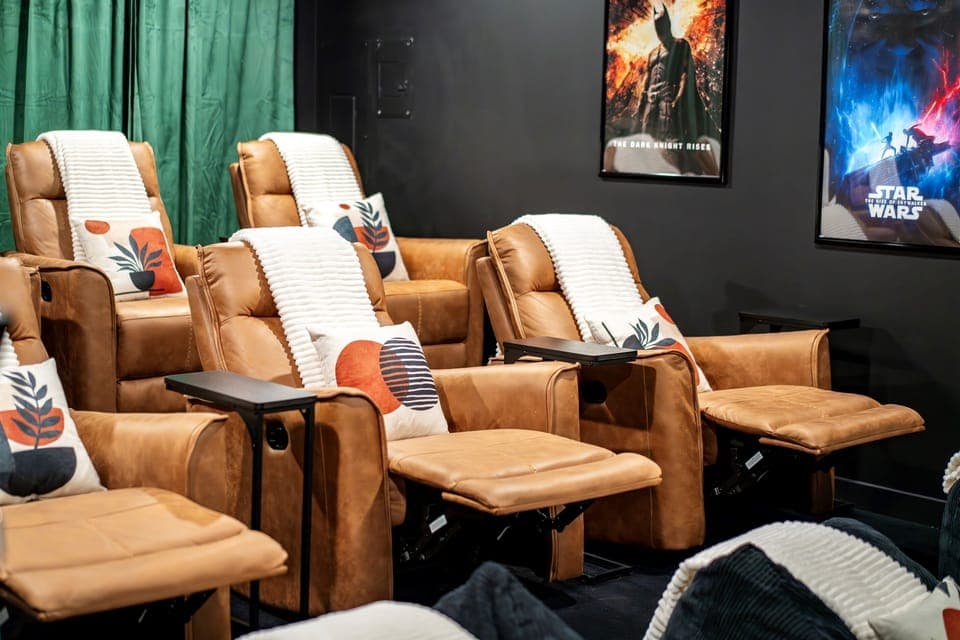 🎥 Movie nights made perfect! Enjoy your favorite films in our theater room, complete with reclining leather chairs, a popcorn machine, and an 85-inch TV for the ultimate cinematic experience.
