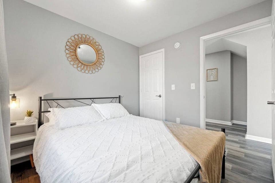 Spacious bedroom with a relaxing ambiance, designed for ultimate comfort and peaceful rest.