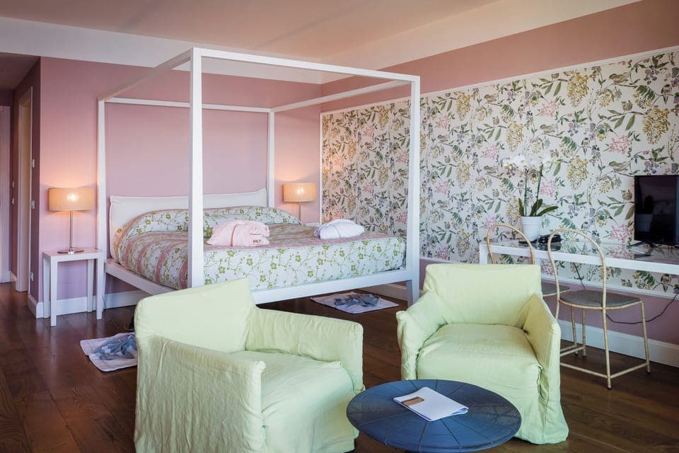 Junior Suite, Lake View | Down comforters, minibar, in-room safe, desk