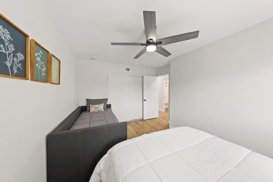 Bedroom with ceiling fans