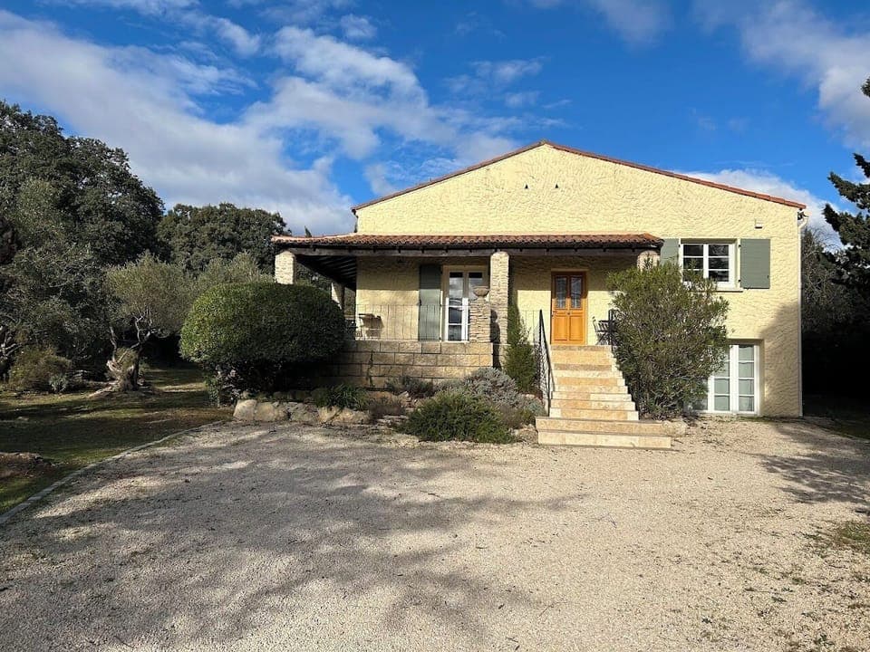Spacious grounds and a wrap around stone porch.