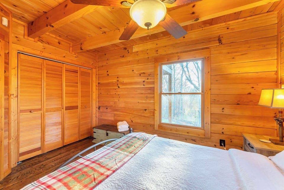 Find comfort and convenience in this cozy room with a spacious closet for all your essentials.