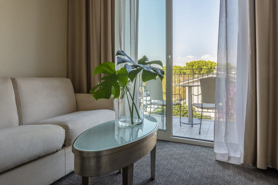 Suite, Balcony, Lake View | Premium bedding, down comforters, minibar, in-room safe