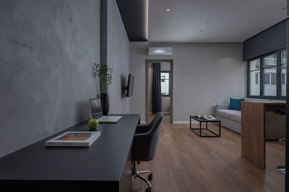 Junior Suite | Living area | 45-inch flat-screen TV with cable channels