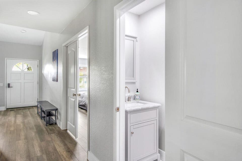 Hallway to bedroom and bathroom