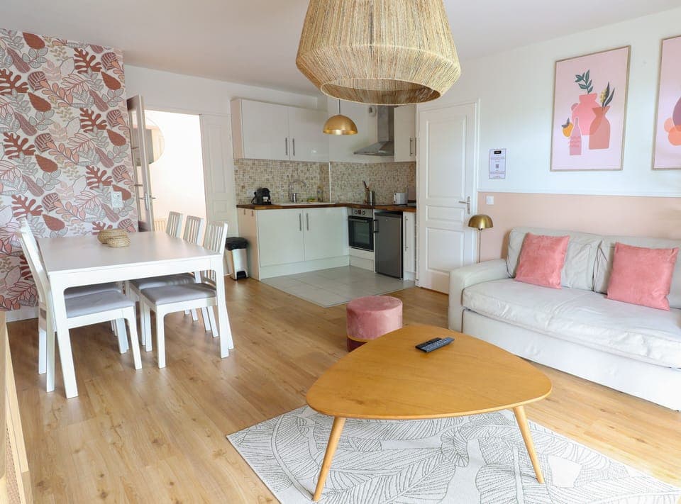 Deluxe Apartment, Garden View | Living area | 119-cm Smart TV with digital channels