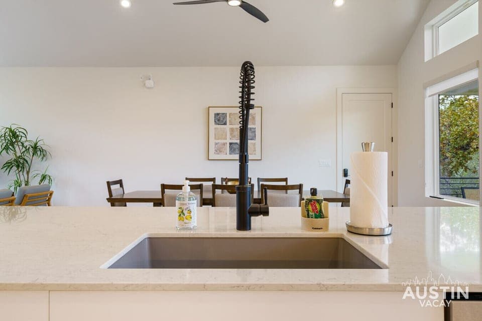 Say hello to your new kitchen MVP: a sleek, high-arc faucet that’s as flexible as your plan, perfect for filling tall pots or sneaking a quick sip.