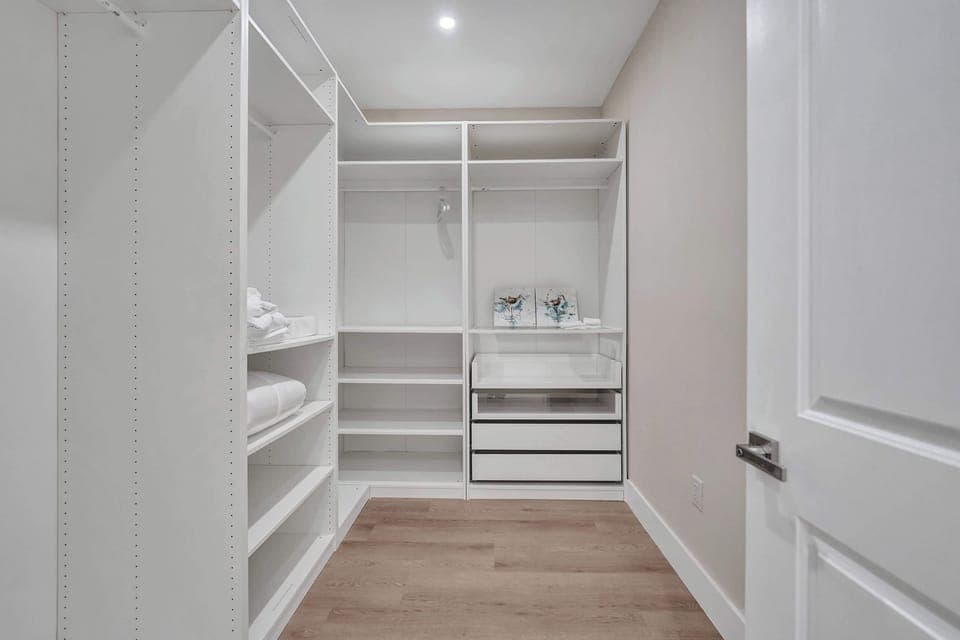 Ample storage space, including a closet with hangers and shelving for extended stays.