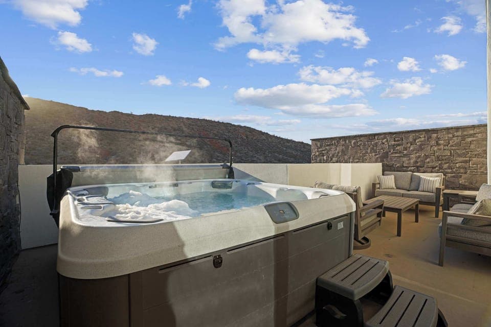 Relax in the private roof top hot tub!