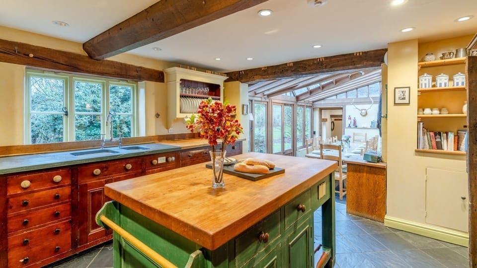 The traditional kitchen has plenty of space for preparing meals