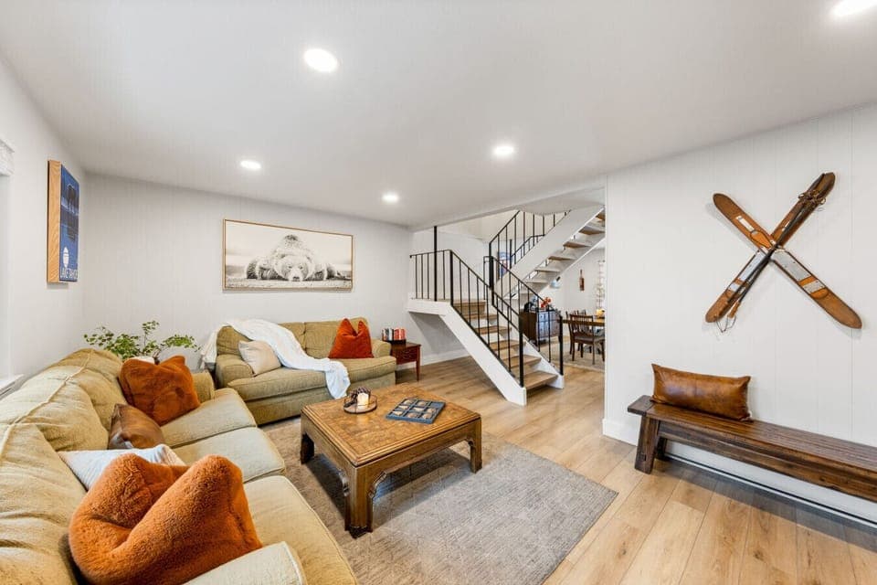 Comfy living room with wood burning fireplace.