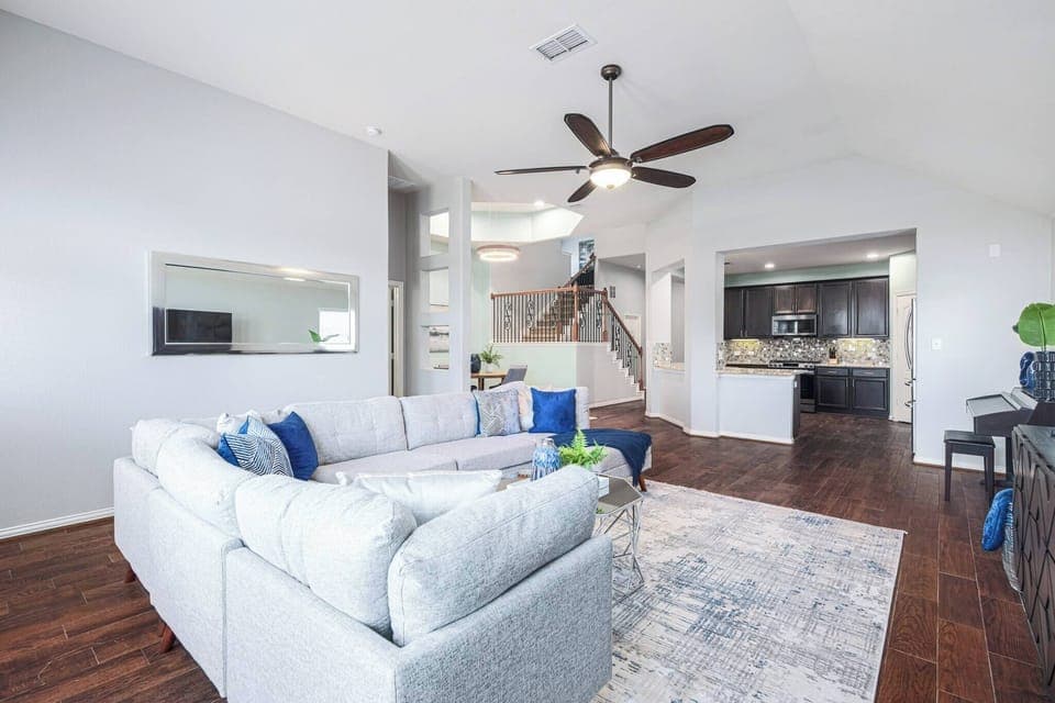 Experience the seamless flow from the kitchen to the living room, allowing you to cook while watching TV or keeping an eye on the kids. The open layout is ideal for quality time together!