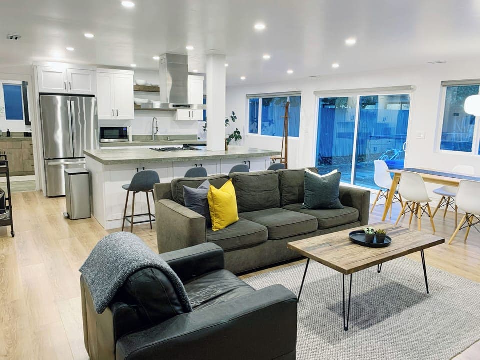 Featuring a cozy sofa and leather armchairs for relaxing or chatting.