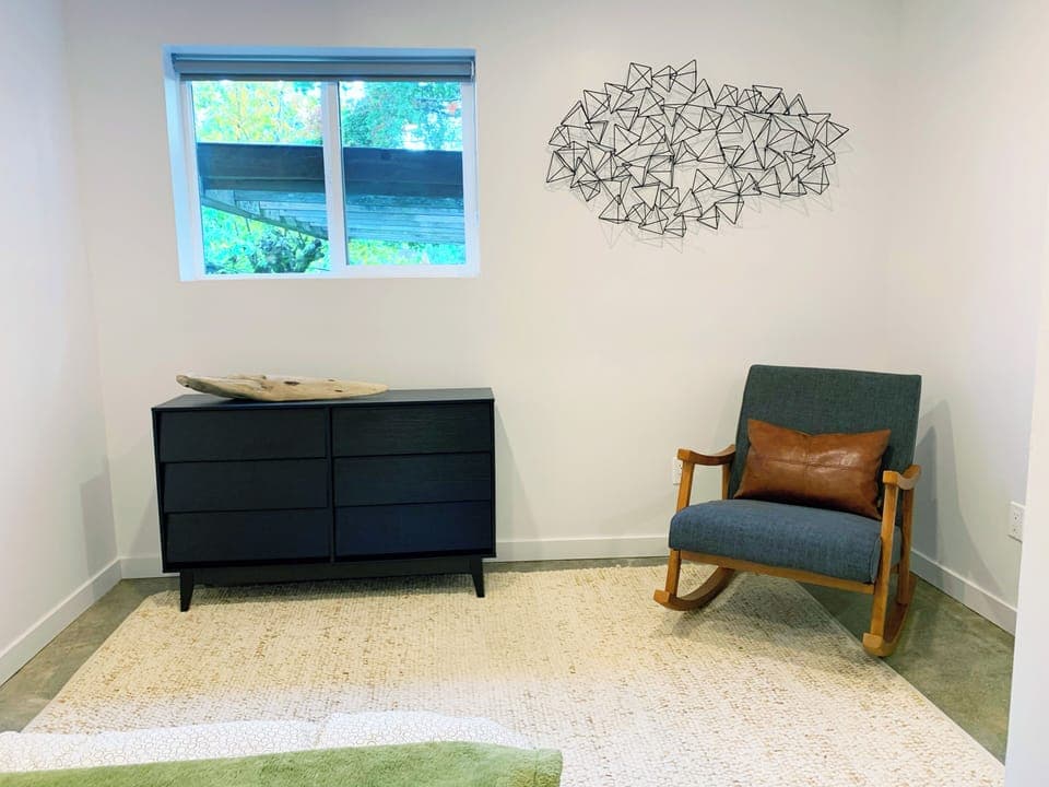 Extra storage for longer stays and boasts a comfortable rocking chair. 