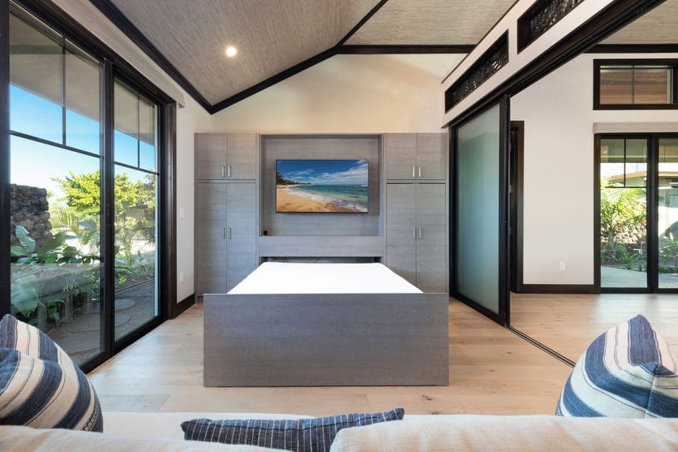 The den is perfect for watching TV or used as an alternative sleeping area. 