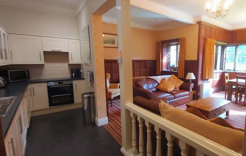 Gallery kitchen open to the living dining room