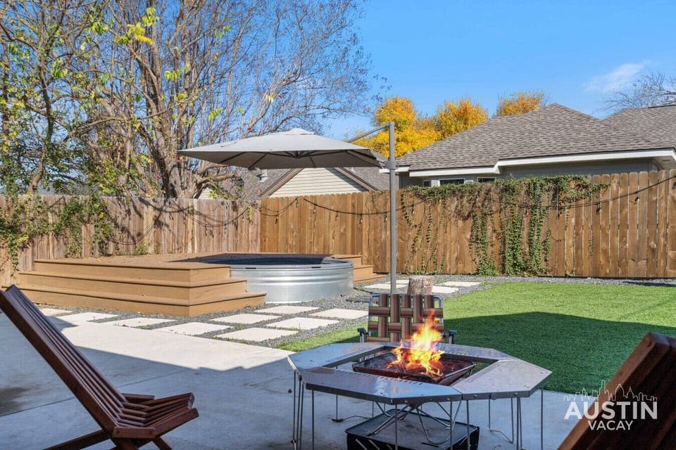 From cozy fireside chats to bubbly hot tub sessions, this backyard has it all. Consider this your personal escape from the everyday. Just add good company (or a good book!).