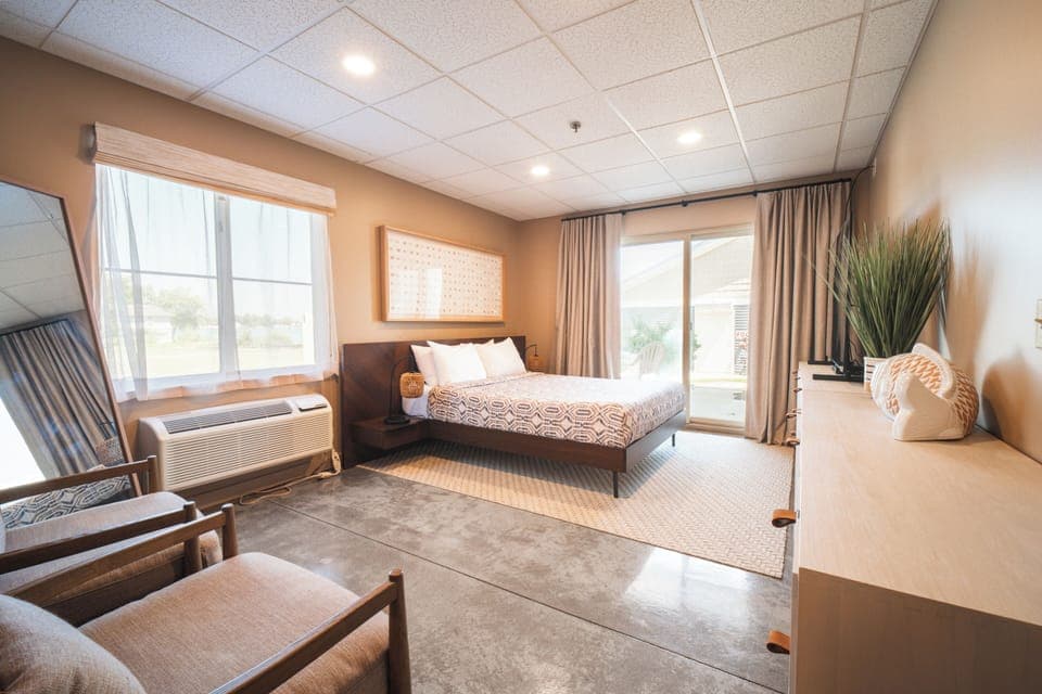 Bedroom with walk out patio.