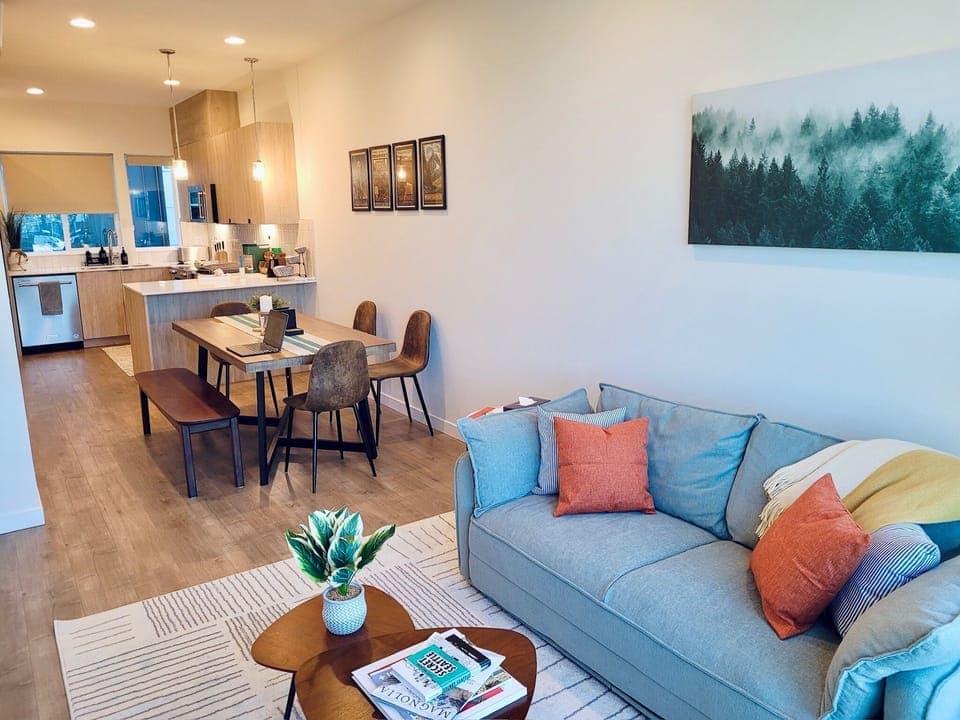 An open-concept design with a seamless flow between the living, dining & kitchen