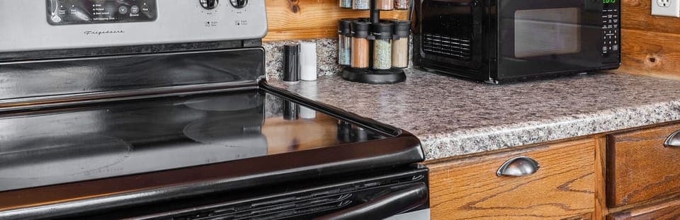 Cook up your favorite meals in this sleek and functional kitchen with everything you need at your fingertips.