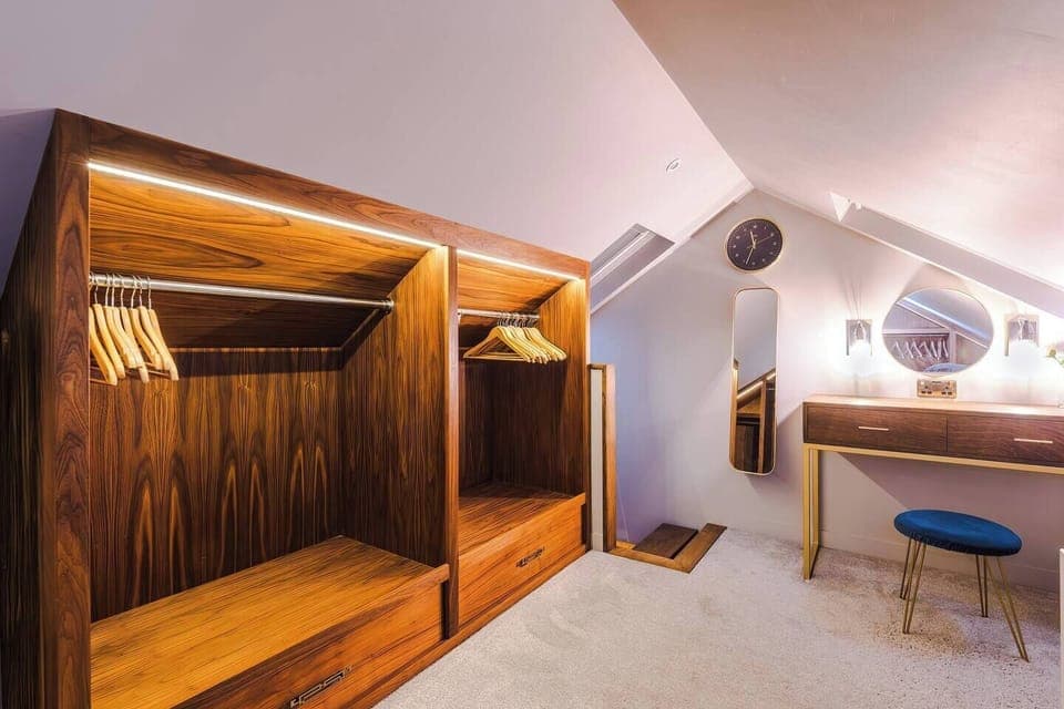 Dressing room/quiet office space connected to Bedroom 1 from A single spine staircase. 