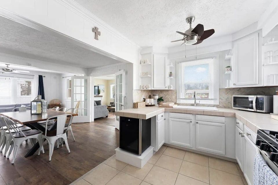 Kitchen is complete with a wine refrigerator