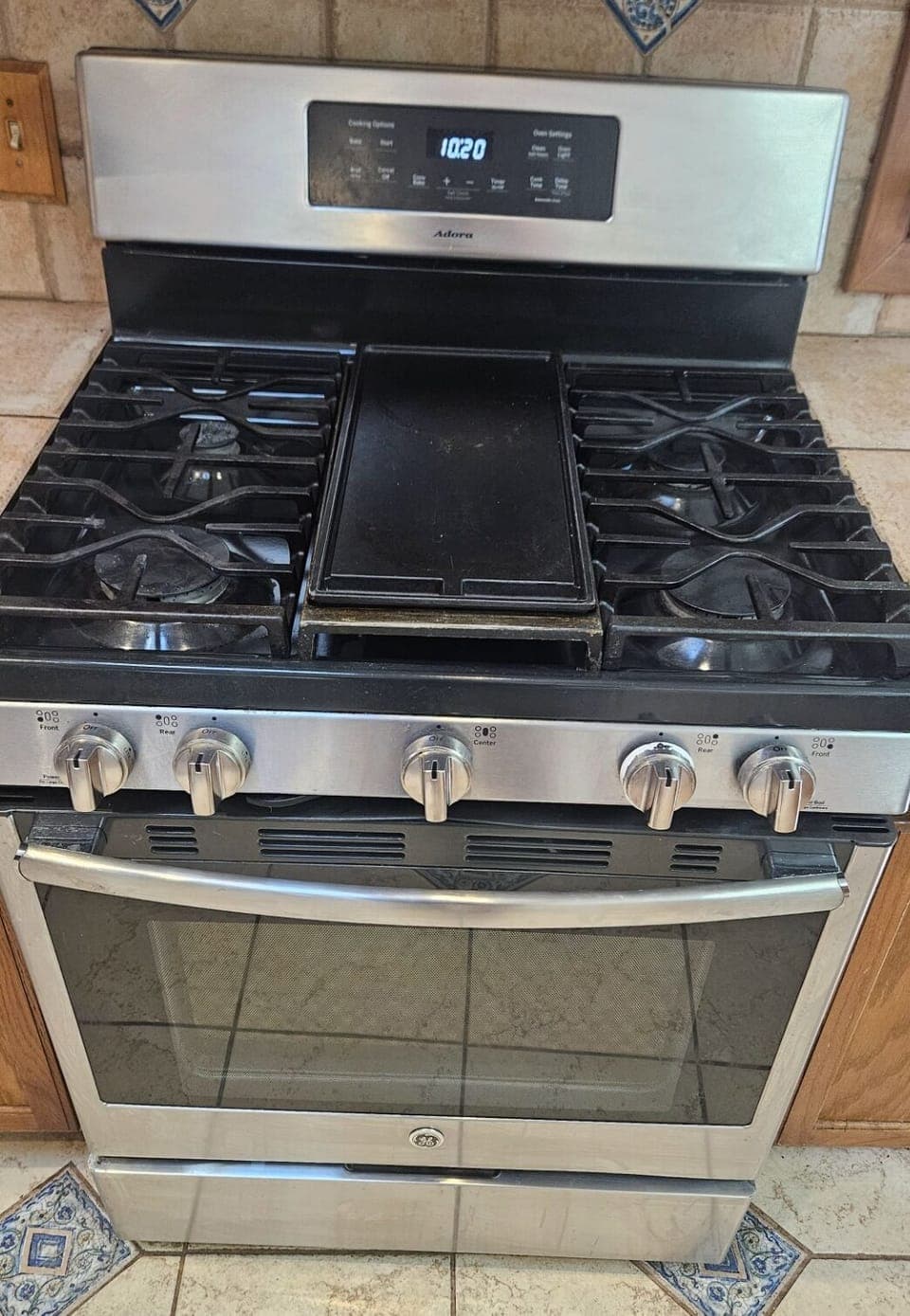 Gas stove with full complement of Stainless steel cookware and  nice cutlery