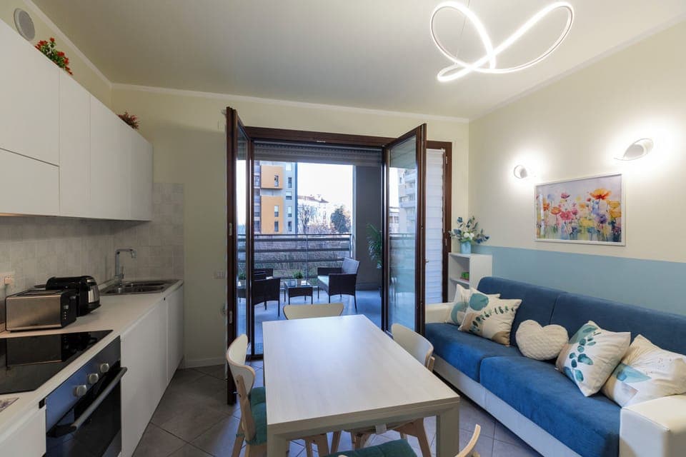 Deluxe Apartment, Garden View | Living area | 50-cm TV with digital channels