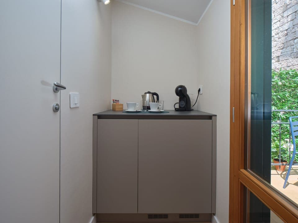 Junior Suite with Balcony | Coffee and/or coffee maker