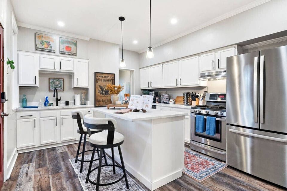 Bright, Spacious, and Fully Stocked – This open kitchen is made for group meals, snack raids, and long morning coffee sessions.