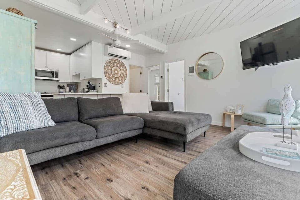 Lovely spacious beach cottage with of plenty of natural light and just steps to the beach.