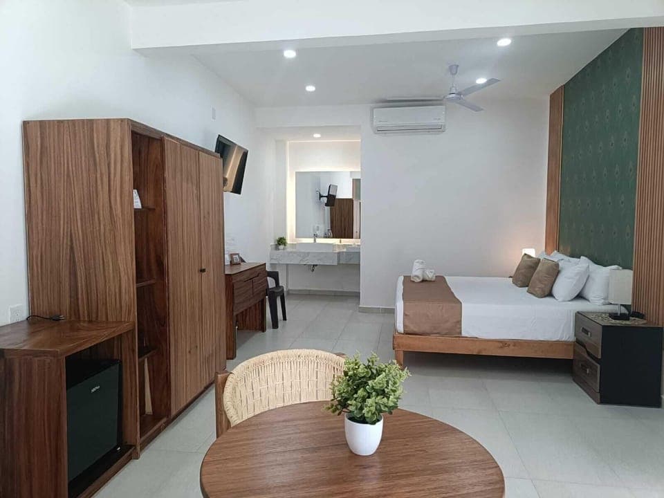 Family Studio Suite | Hypo-allergenic bedding, down comforters, in-room safe, blackout drapes