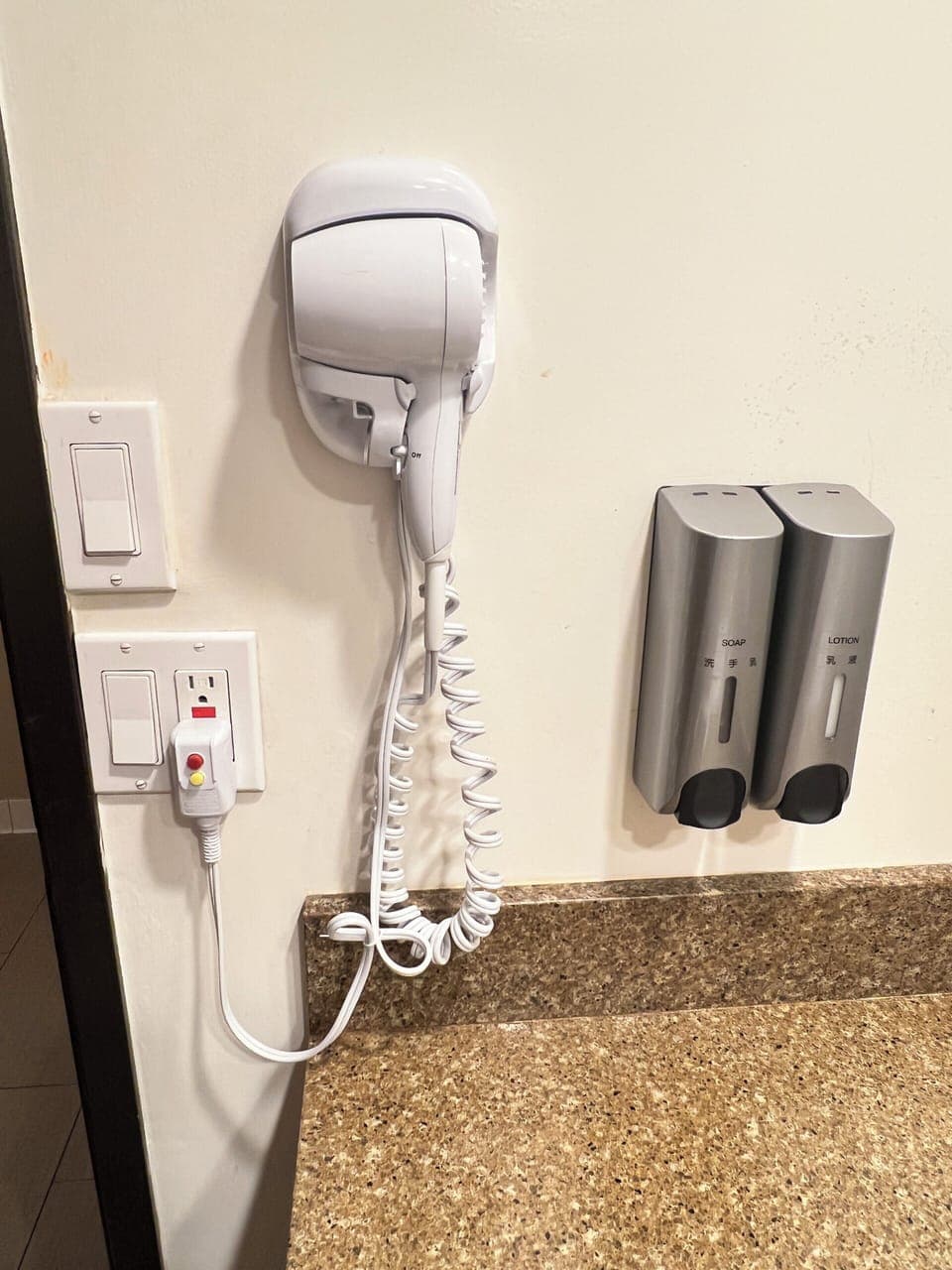 Hair dryer, towels, soap, shampoo