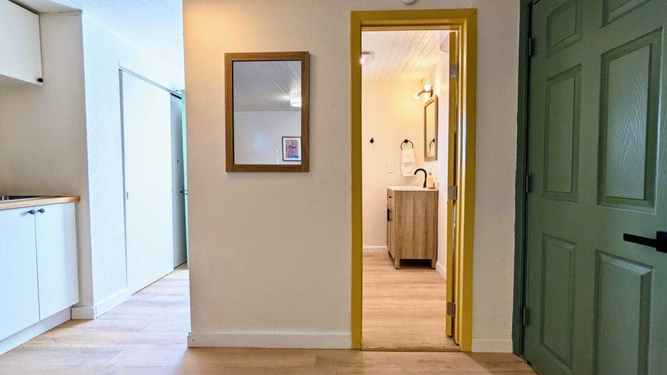 Light and airy bathroom with a sleek stand-up shower and modern finishes.