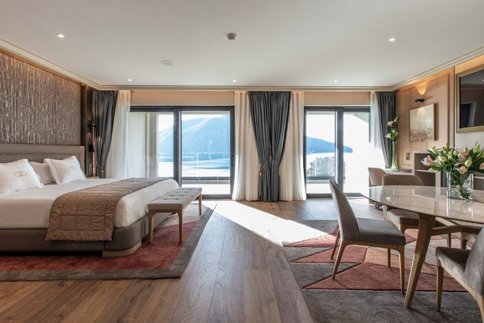 Junior Suite, Terrace, Lake View | Minibar, in-room safe, blackout drapes, free WiFi