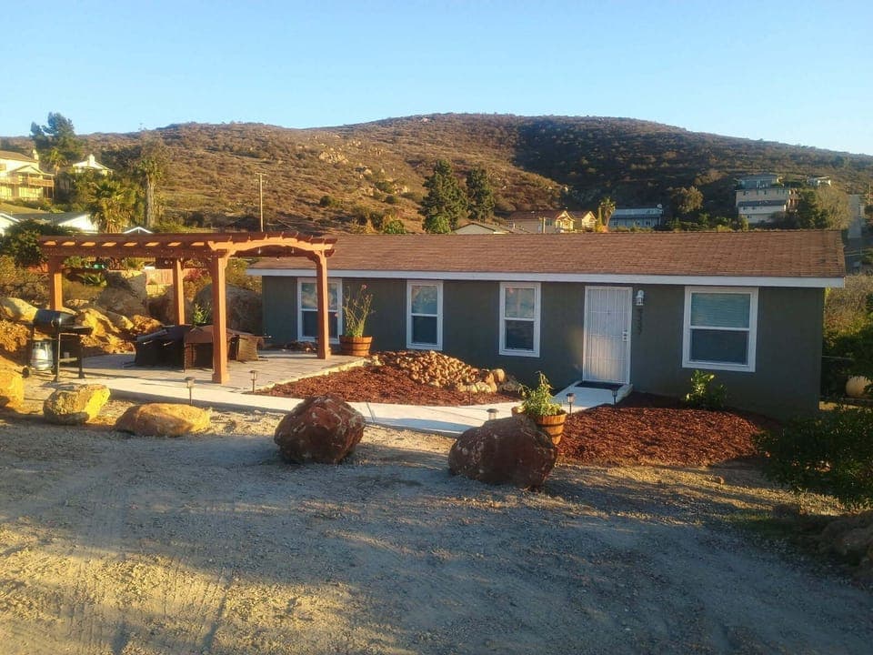 Front of Casa Monte Mar and front patio with fire pit. Amazing views at night!