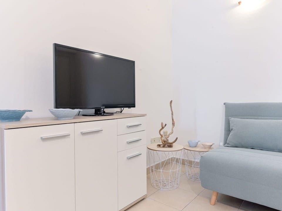 Furniture, Interior Design, Floor, Room, Flooring, Apartment, Living Room, Television