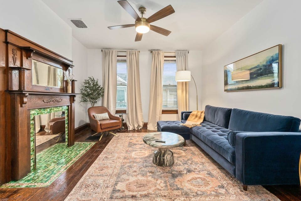 Curl up in Unit 94’s chic living room & stream your favorites on the smart TV