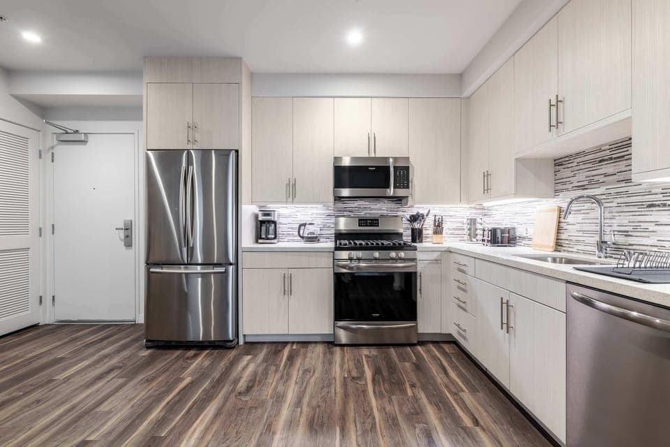 Full panoramic view of the kitchen — sophisticated, functional, and inviting, with a balance of form and practicality.