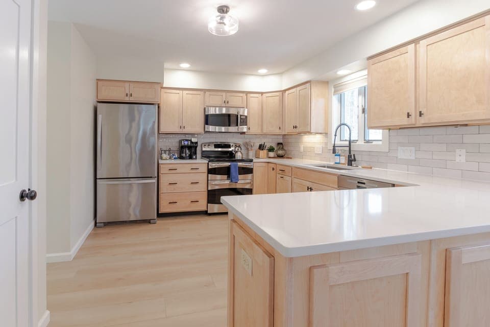 Spacious kitchen includes deep basin sink, coffee bar, crockpot, toaster, & more