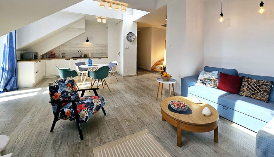 Comfort Apartment, Balcony | Living area | 50-inch LCD TV with cable channels