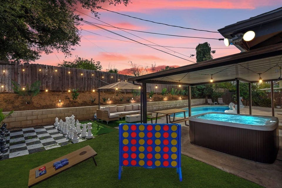 Backyard with Chess Board, Connect 4 and Cornhole Games